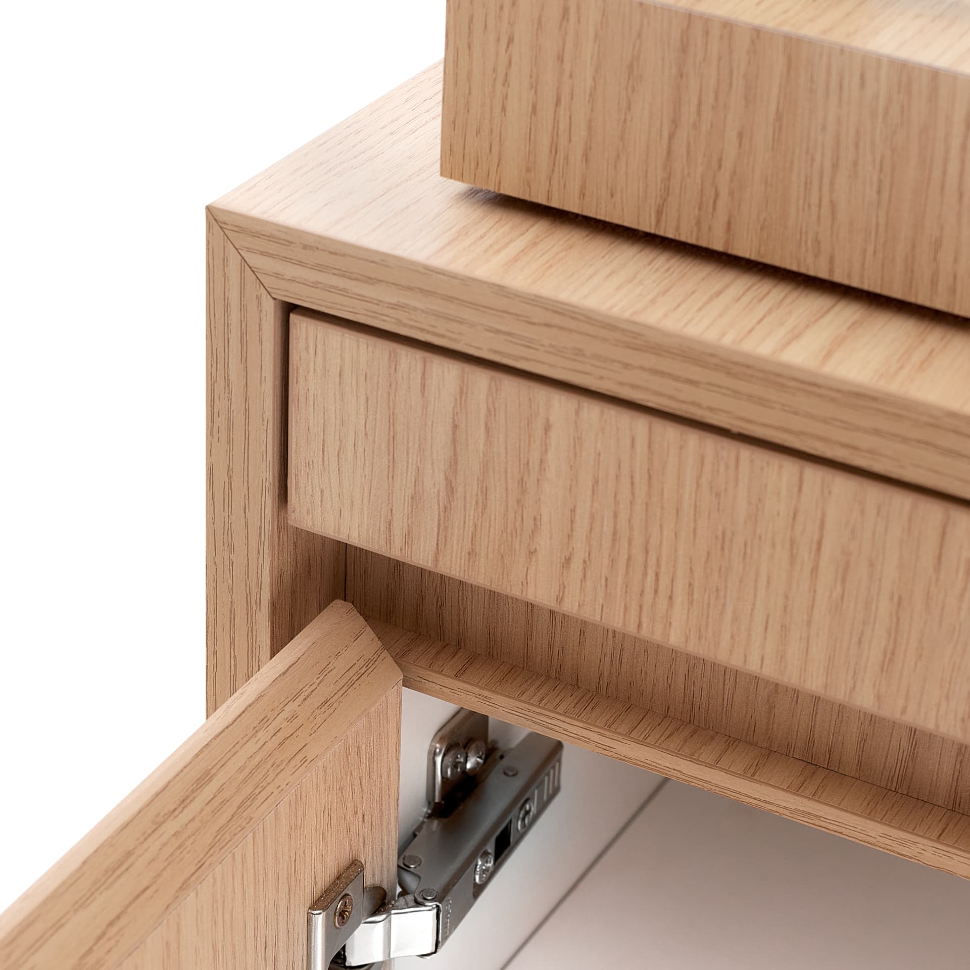 Close-up of oak drawer fronts with concealed hinge detail