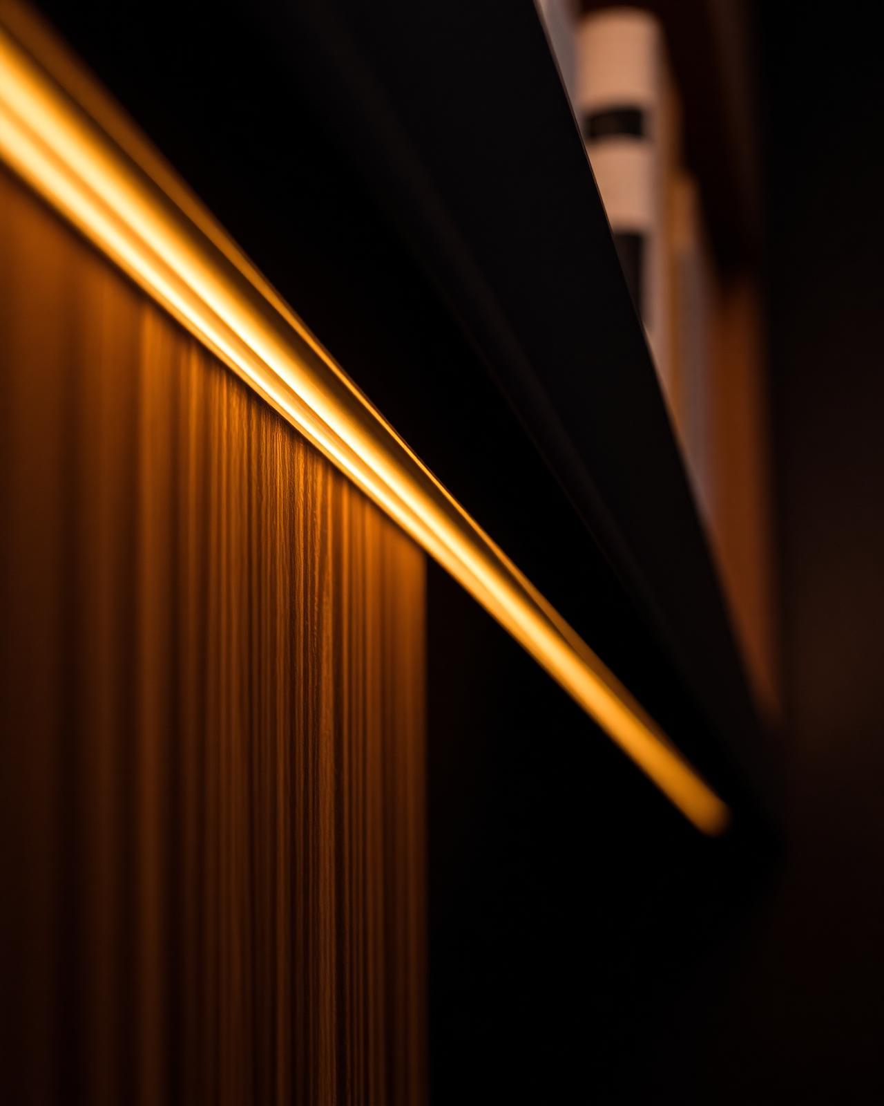Integrated linear lighting embedded into custom millwork